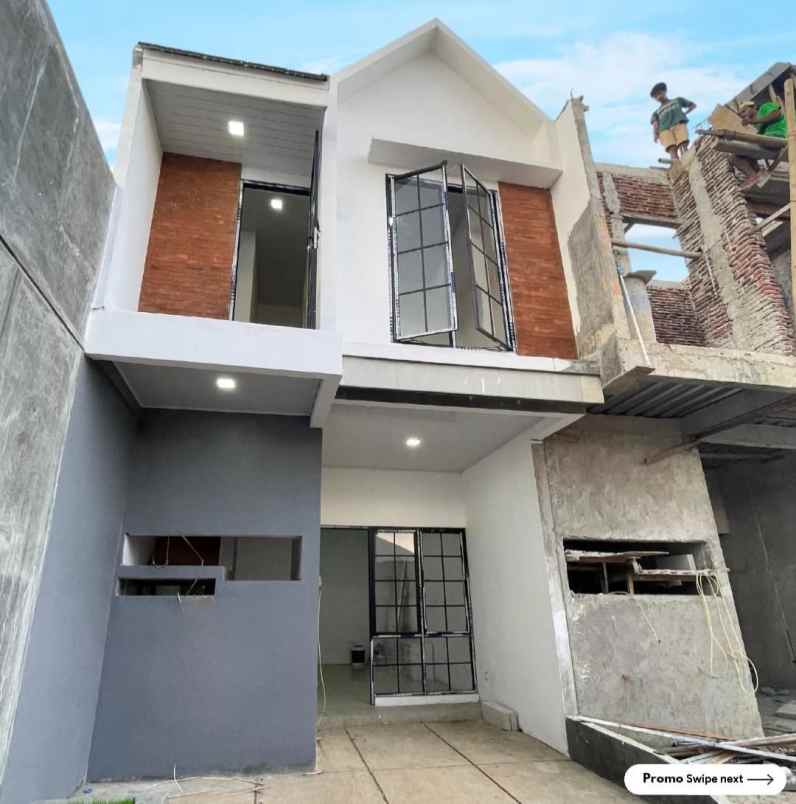 dijual rumah jalan boulevard graha raya