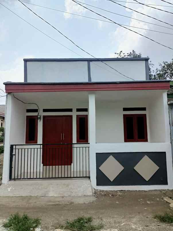 dijual rumah jalan haji kimah