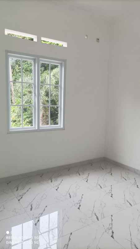 dijual rumah jl raya jatiwaringin