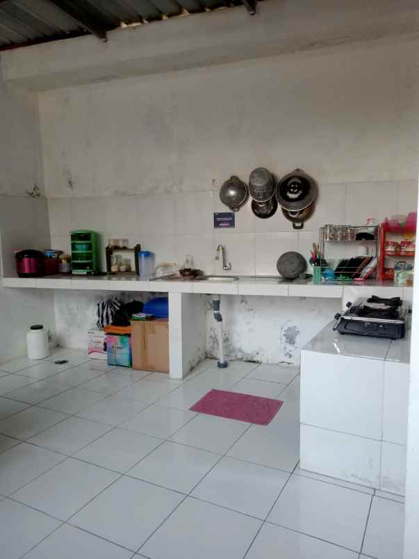 dijual rumah kost aktif dijakal km 12