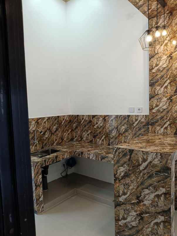 dijual rumah perum pesona anggrek bekasi