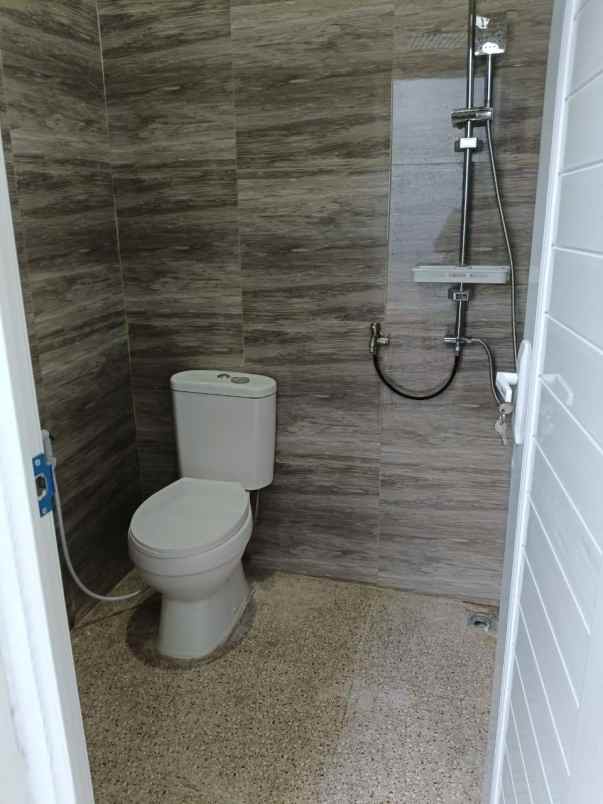 dijual rumah perum pesona anggrek bekasi