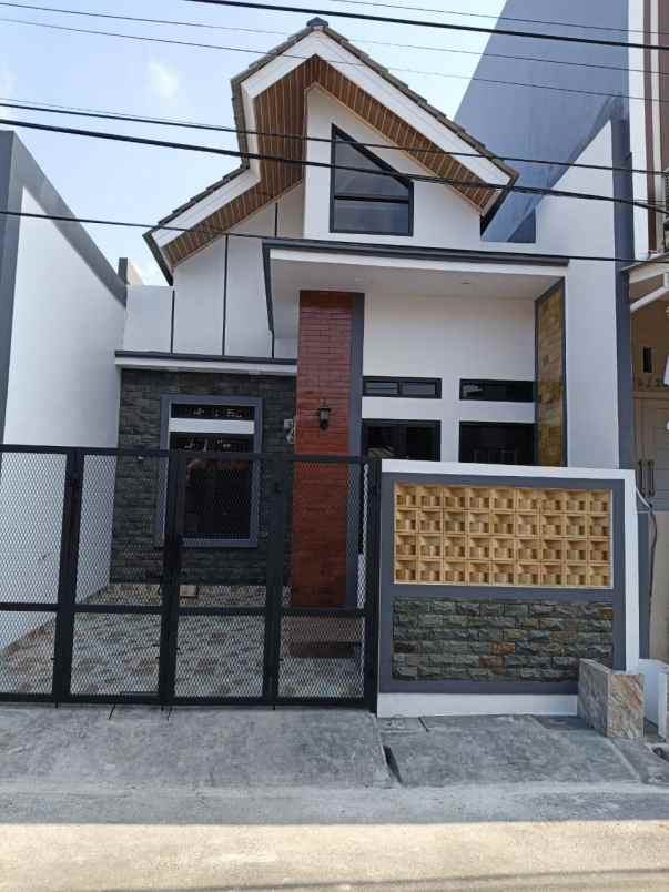 dijual rumah perum pesona anggrek bekasi