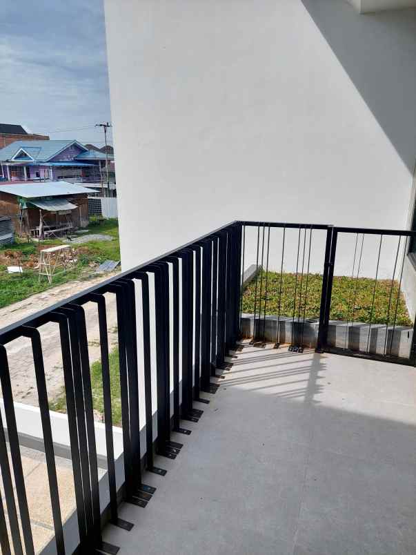 rumah cluster 2 lantai di jalan bakti pekanbaru