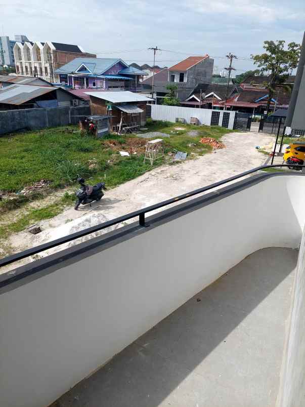 rumah cluster 2 lantai di jalan bakti pekanbaru