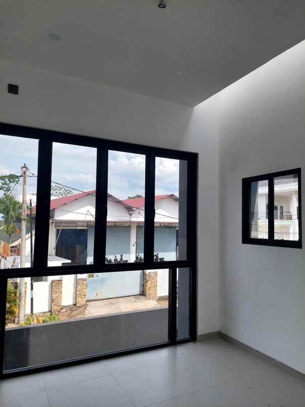 rumah cluster 2 lantai di jalan bakti pekanbaru