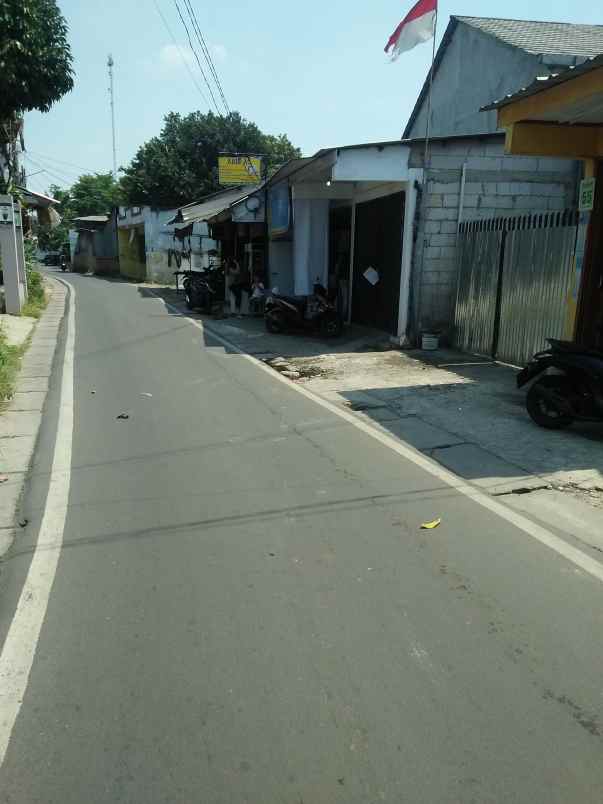 rumah tinggal pinggir jalan raya