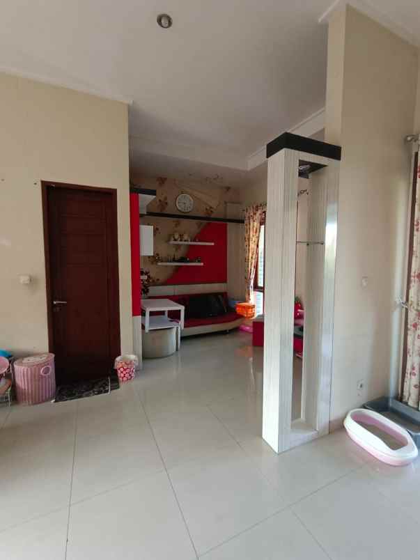 dijual rumah cluster puri suryalaya