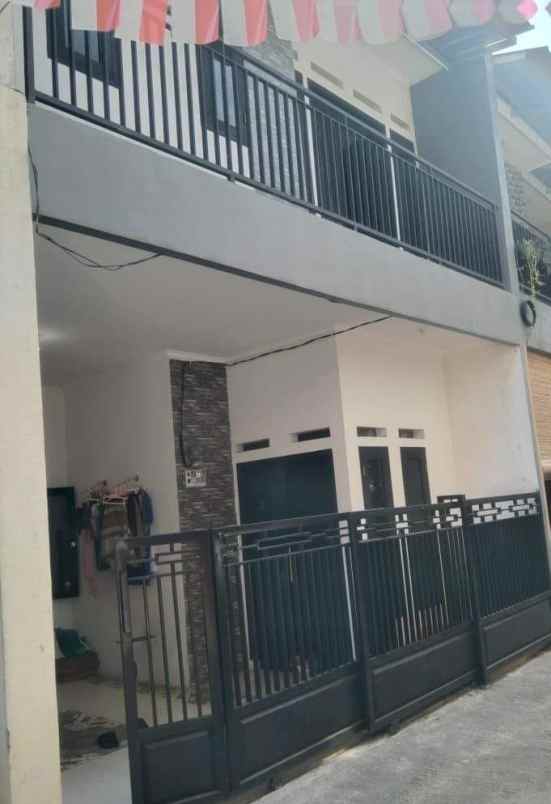 dijual rumah dalam cluster di rawageni ratujaya depok