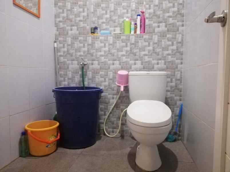 dijual rumah jalan pondok kelapa raya