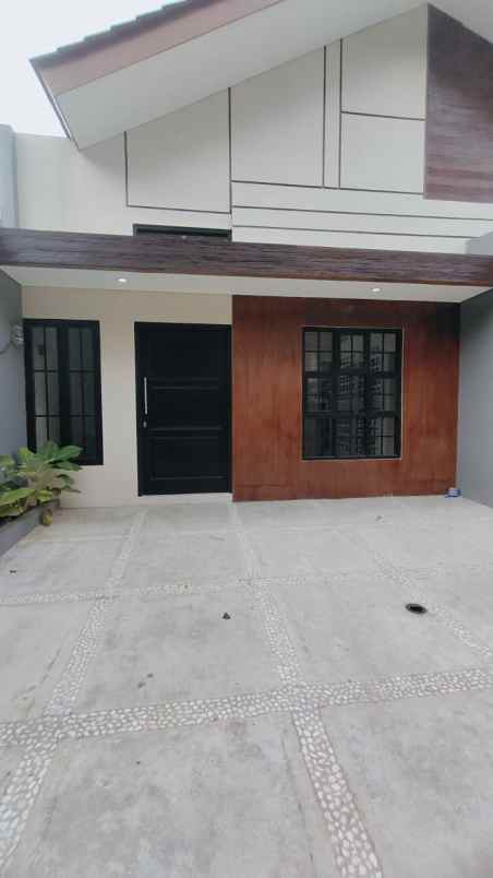 dijual rumah jalan raya aria putra