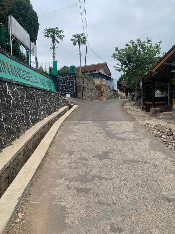 dijual rumah jl raya cinanggela samping
