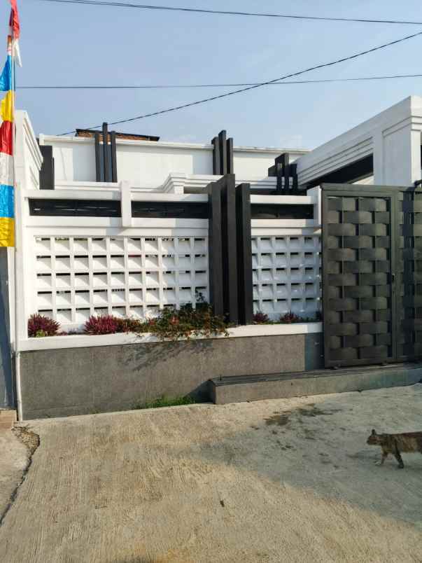 dijual rumah komplek cidura regency