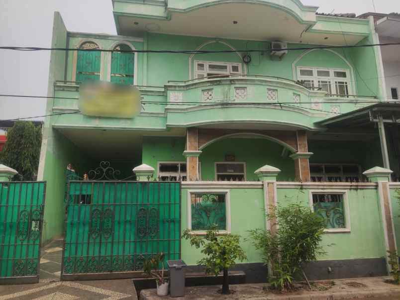 dijual rumah komplek perumahan taman