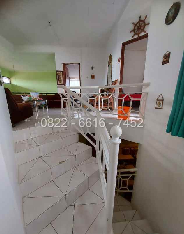 dijual rumah komplek sariwangi