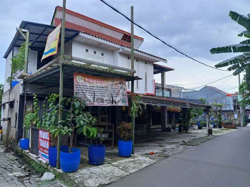 dijual rumah minimalis bonus cafe area tanah baru