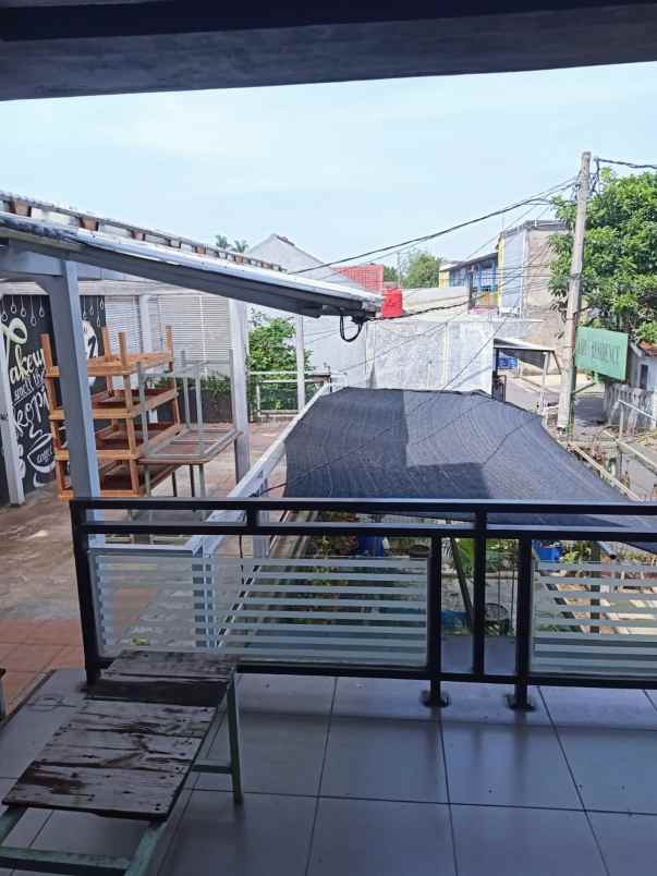 dijual rumah minimalis bonus cafe area tanah baru