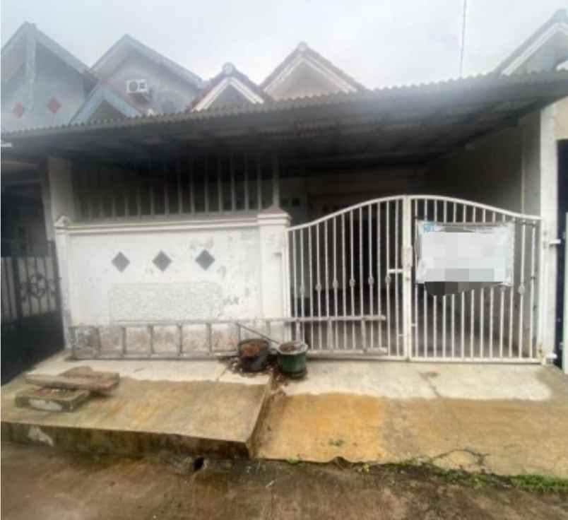 dijual rumah perumahan taman harapan