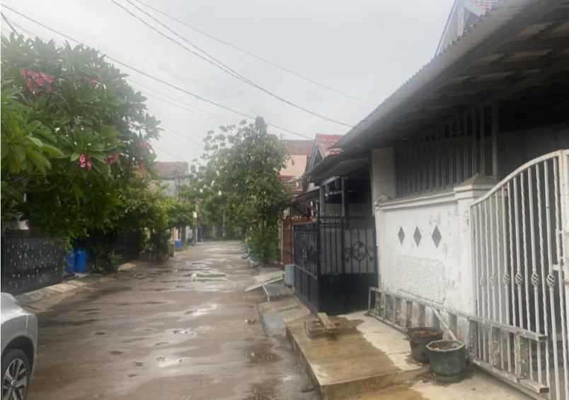 dijual rumah perumahan taman harapan