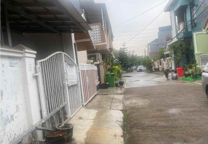 dijual rumah perumahan taman harapan