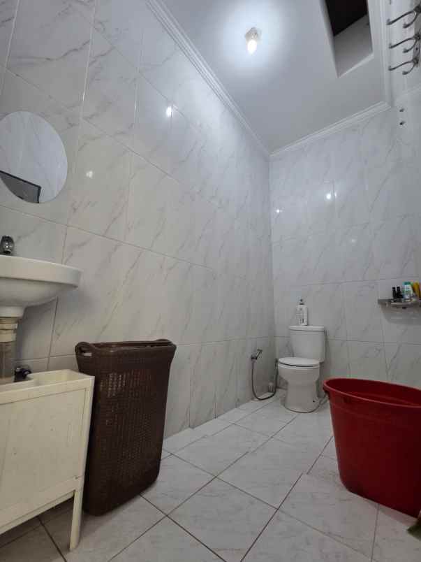 dijual rumah sukatani permai rt 12 rw