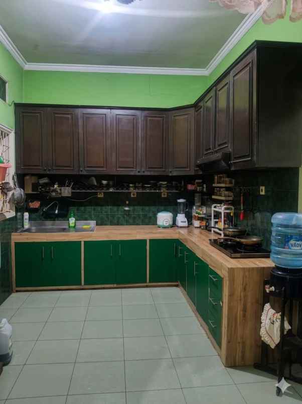 dijual rumah taman modern