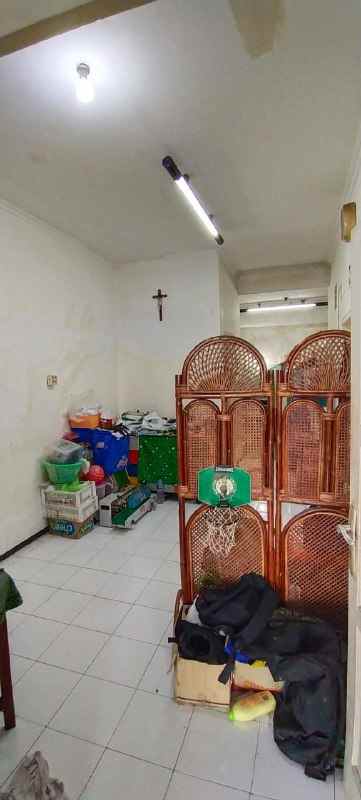 dijual rumah wiguna tengah