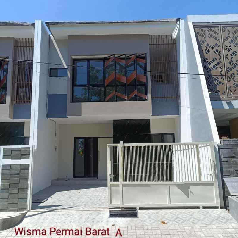 dijual rumah wisma permai barat