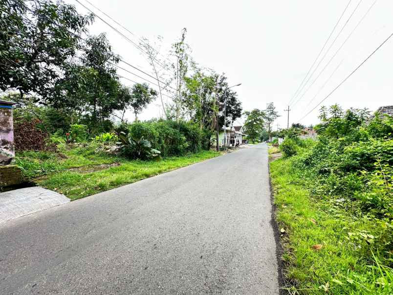 dijual tanah luas di pinggir jalan utama