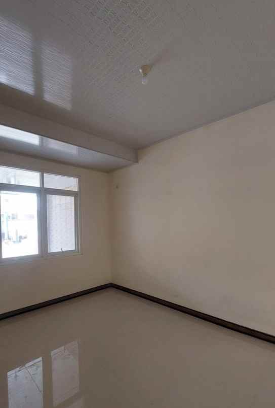 disewakan rumah pantai mentari