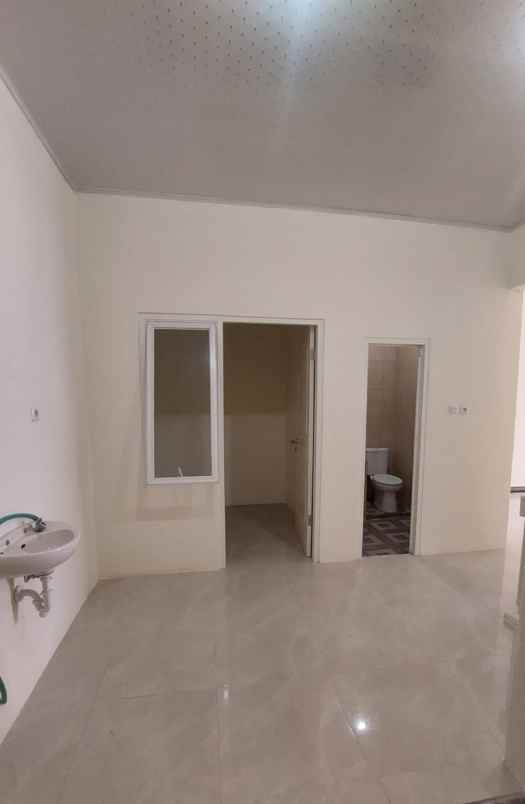 disewakan rumah pantai mentari