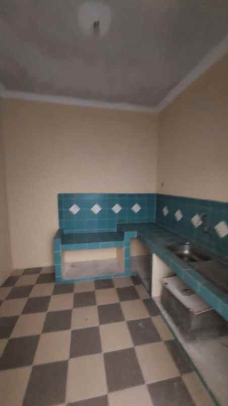disewakan rumah pantai mentari