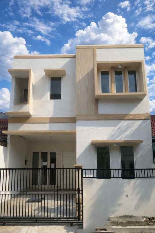 rumah griya asri pakuwon city new minimalis 2 lantai