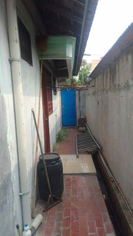 rumah jl raya cibening kel