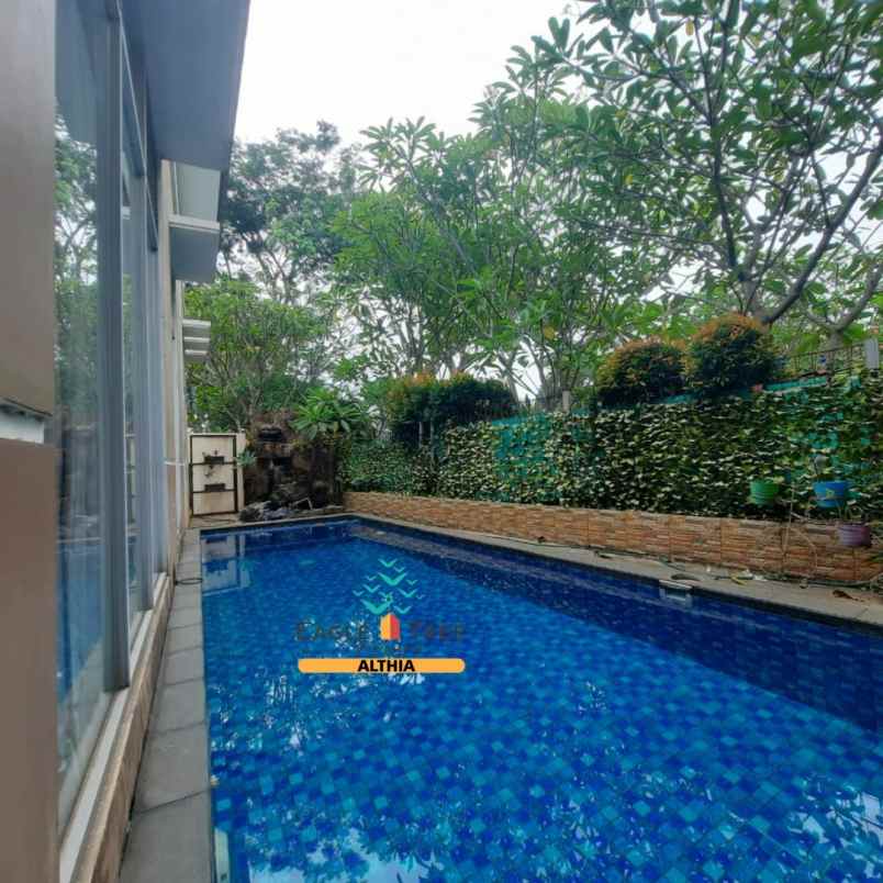 dijual rumah graha raya