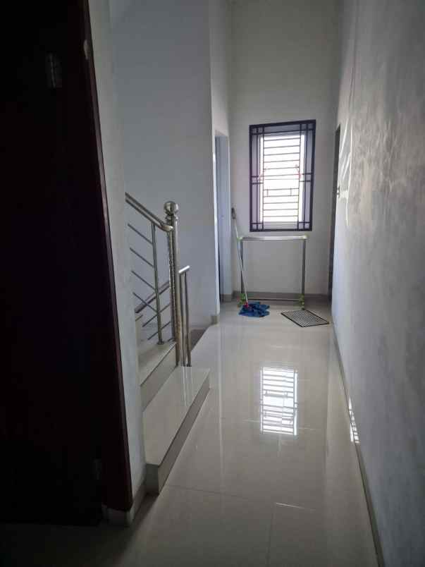 dijual rumah jalan tuasan komplek