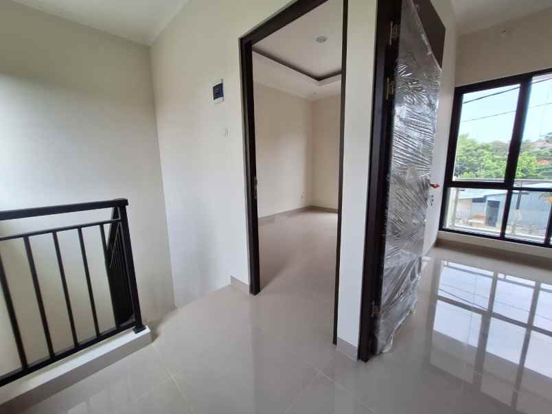 dijual rumah jl raya kodau