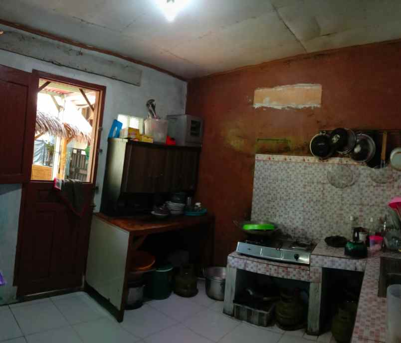 dijual rumah jl raya tonjong