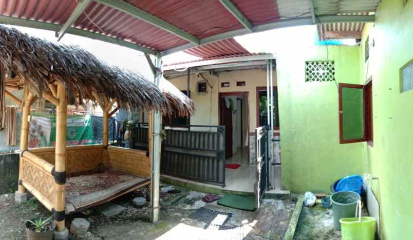 dijual rumah jl raya tonjong