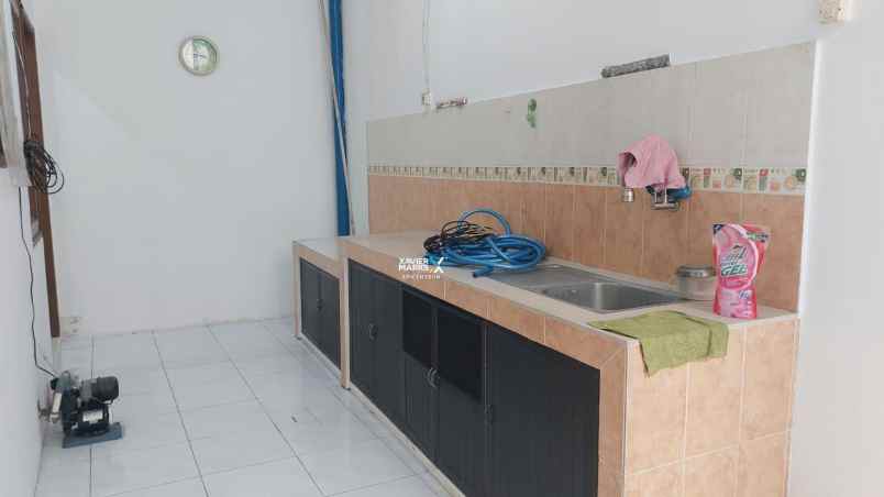 dijual rumah lebak indah regency