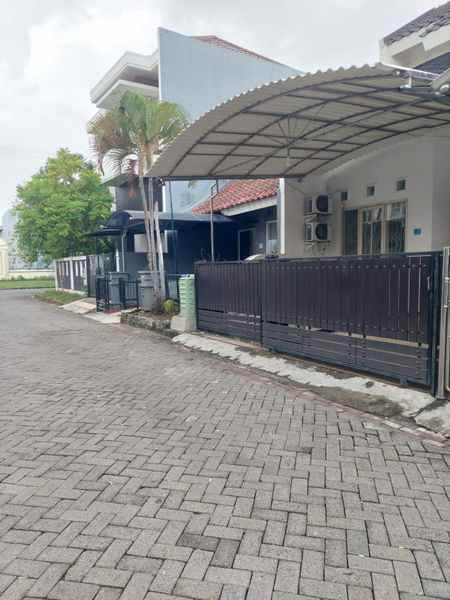 dijual rumah pakuwon city taman mutiara