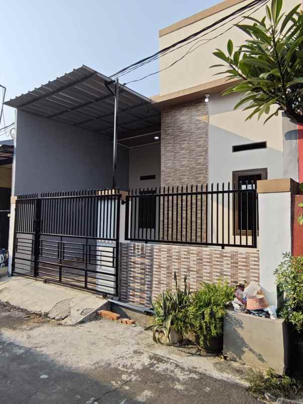 dijual rumah pondok ungu permai cluster