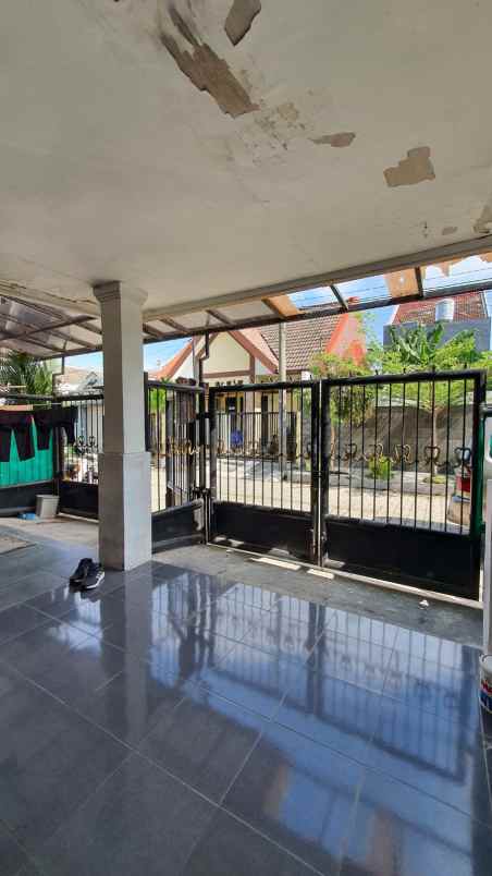 dijual rumah wiguna timur