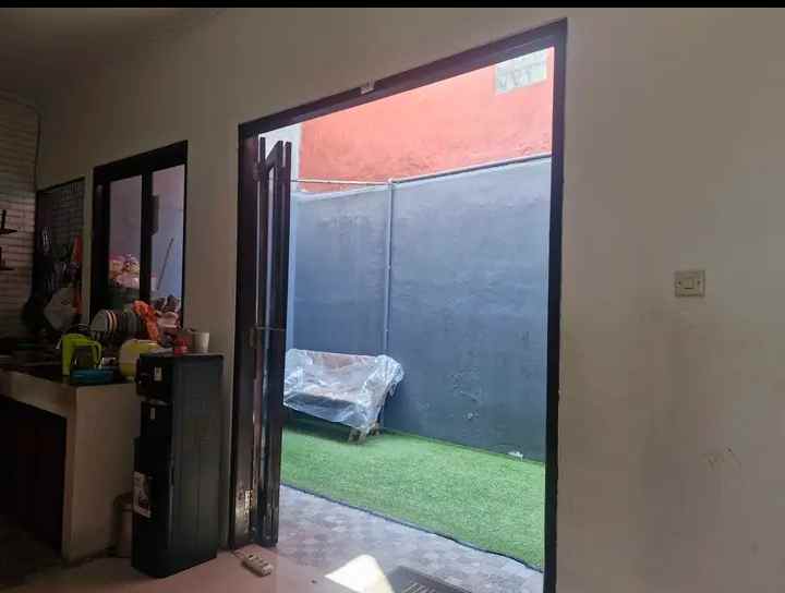 rumah 2lt dalam perumahan kawasan ciherang tapos depok