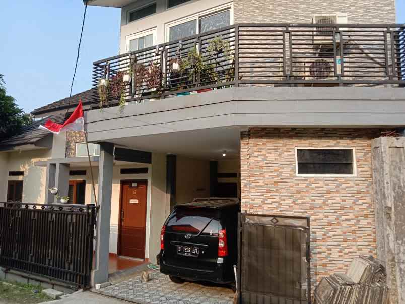 rumah belakang kampus jgu dekat grand depok city