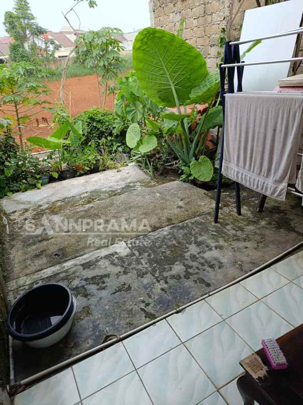 rumah dalam cluster di bukit rivaria sawangan ph