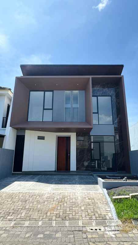 rumah new gress woodland citraland surabaya barat