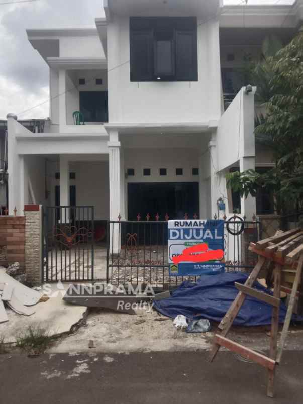 dijual rumah beji