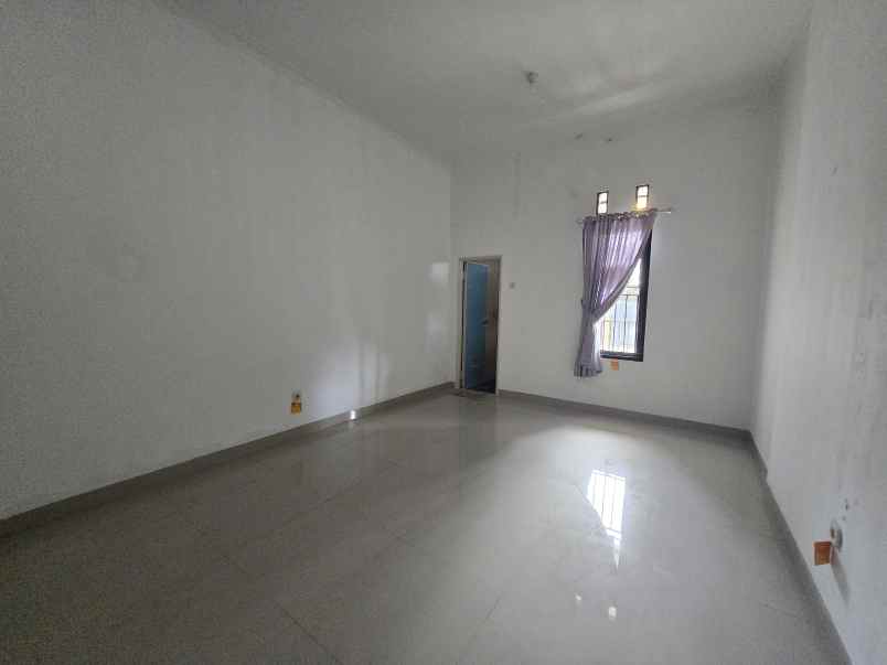 dijual rumah cluster graha indira citra raya tangerang