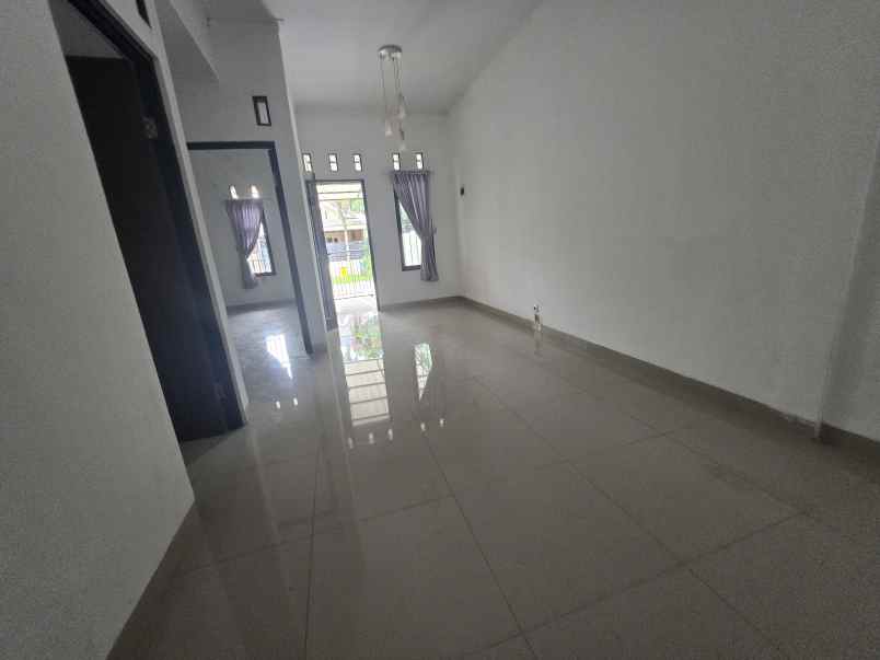 dijual rumah cluster graha indira citra raya tangerang